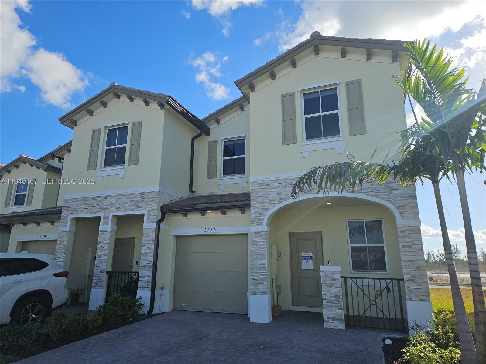 2530 Southeast 29th Street Homestead, FL 33035 - Photo 1 of 21 a front view of a house with a yard