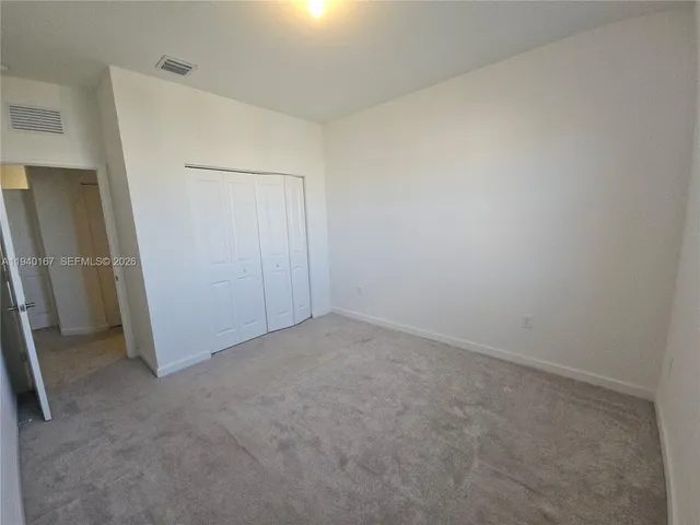 an empty room with closet