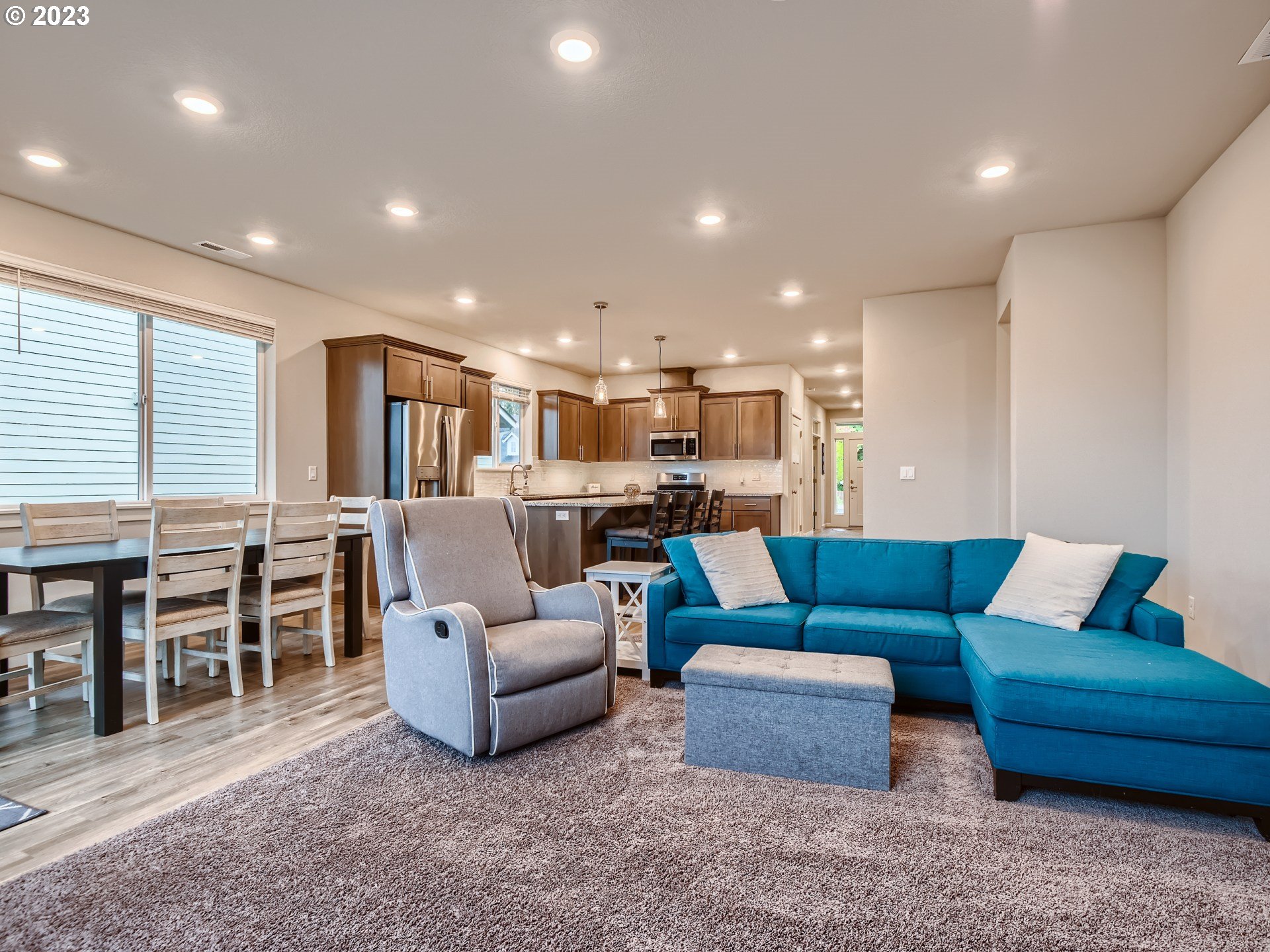 38439 Maple Street Sandy, OR 97055 - Photo 11 of 34 a living room with furniture and kitchen view