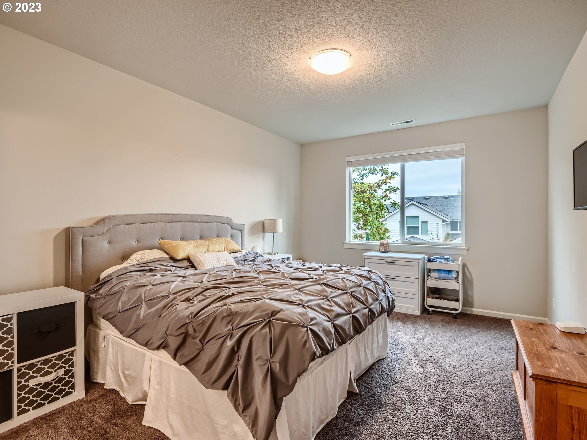 38439 Maple Street Sandy, OR 97055 - Photo 18 of 34 a bed sitting in a bedroom next to a window