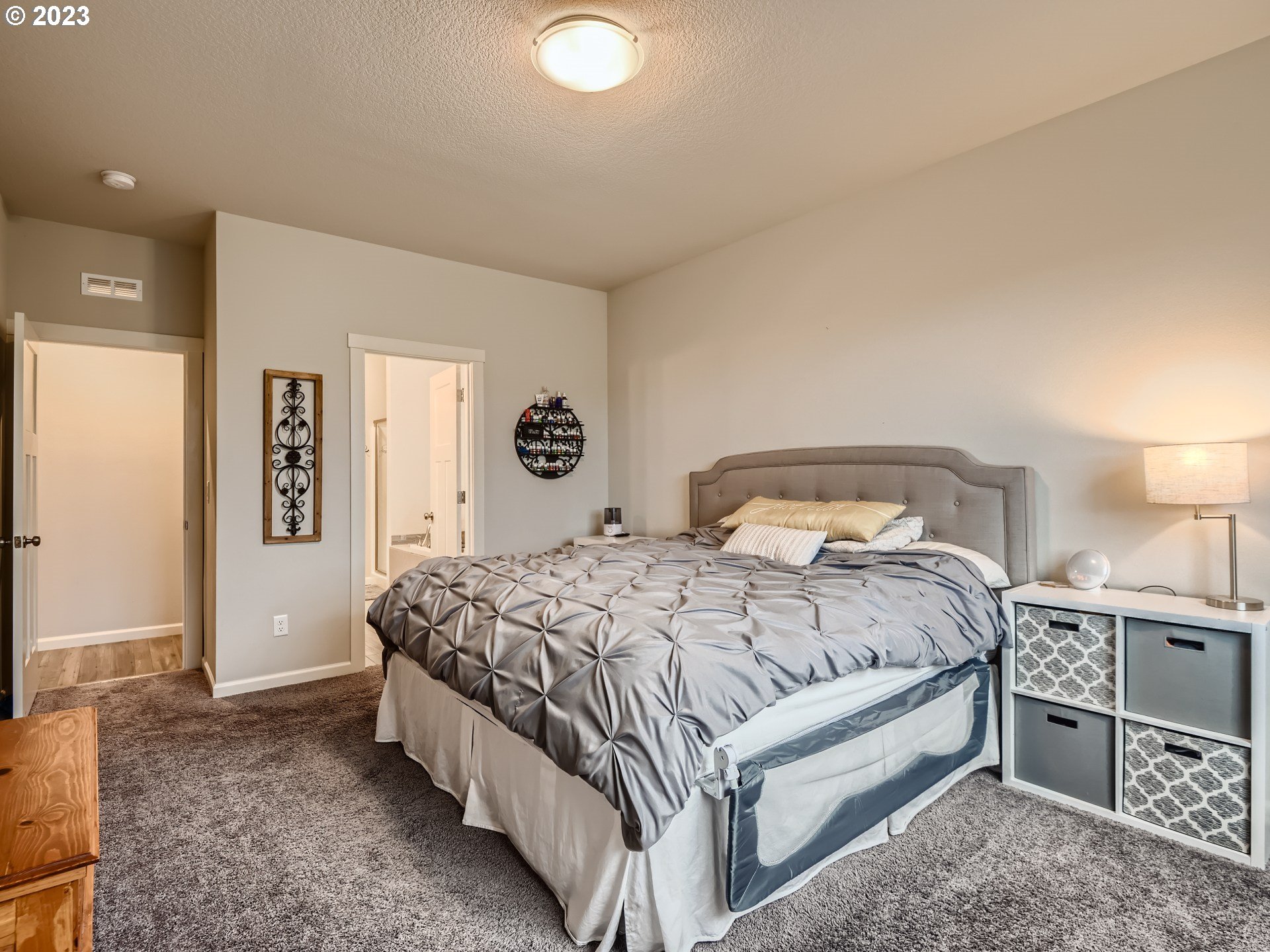 38439 Maple Street Sandy, OR 97055 - Photo 19 of 34 a bedroom with a bed and dresser
