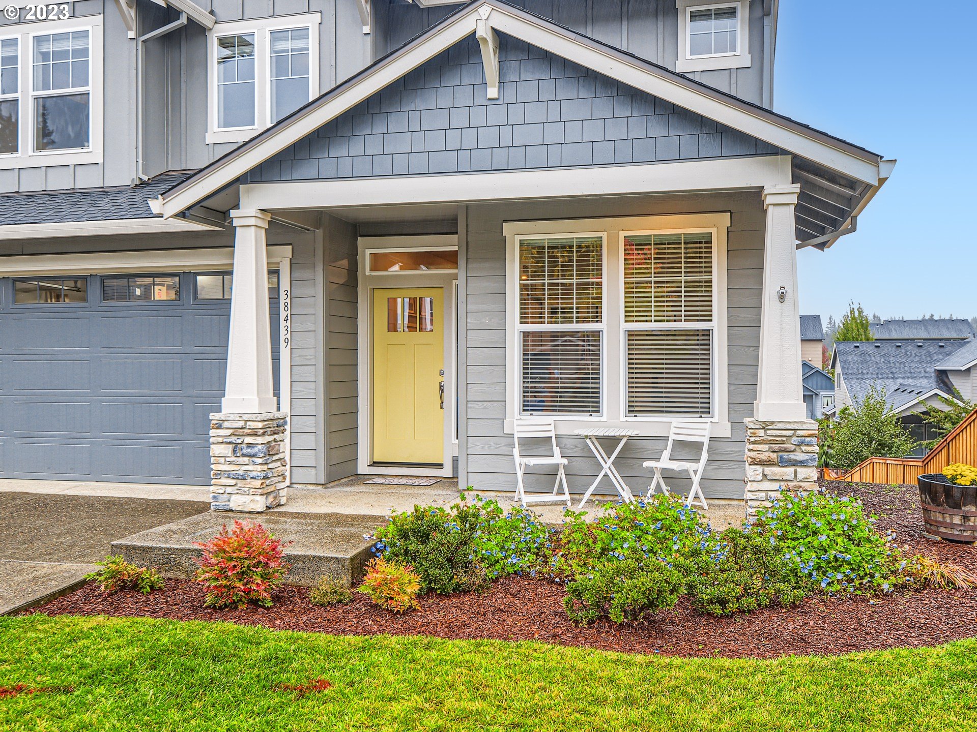 38439 Maple Street Sandy, OR 97055 - Photo 2 of 34 a front view of a house with a yard