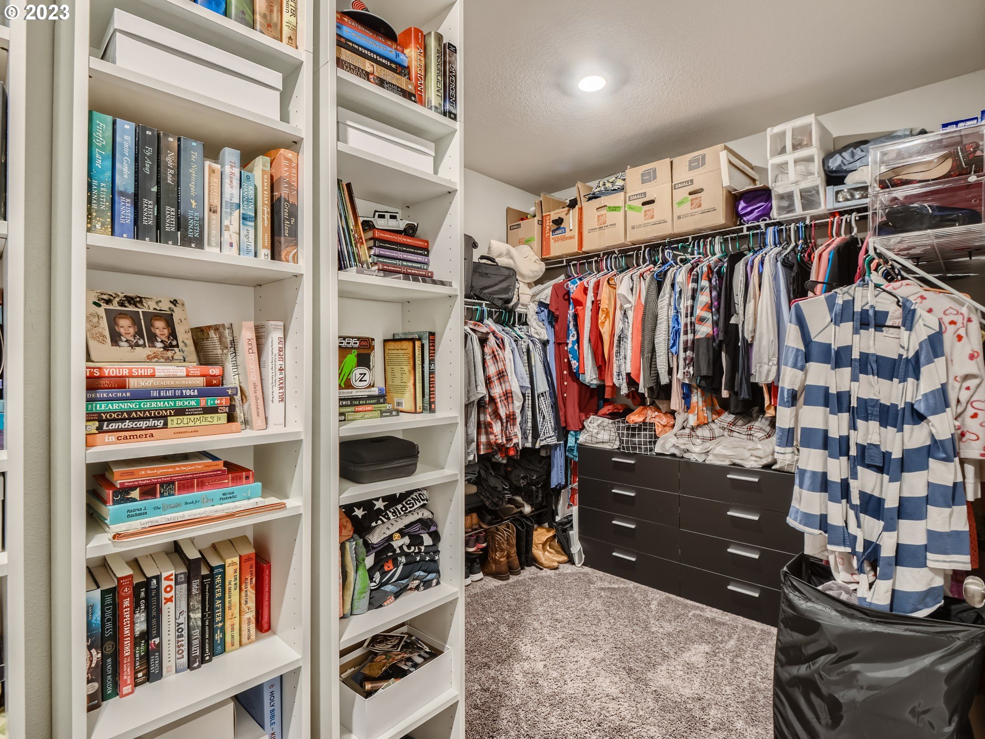 38439 Maple Street Sandy, OR 97055 - Photo 24 of 34 a view of walk in closet with clothes and shoes