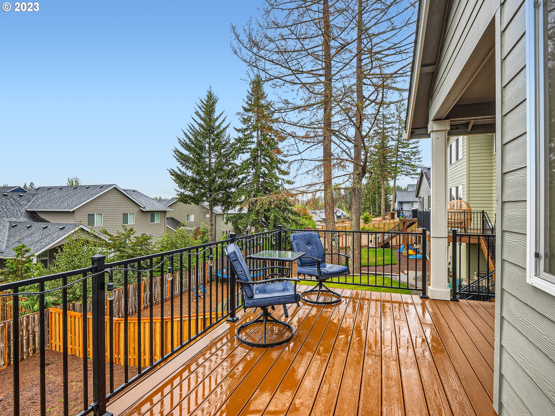 38439 Maple Street Sandy, OR 97055 - Photo 31 of 34 a view of balcony with chairs and wooden fence