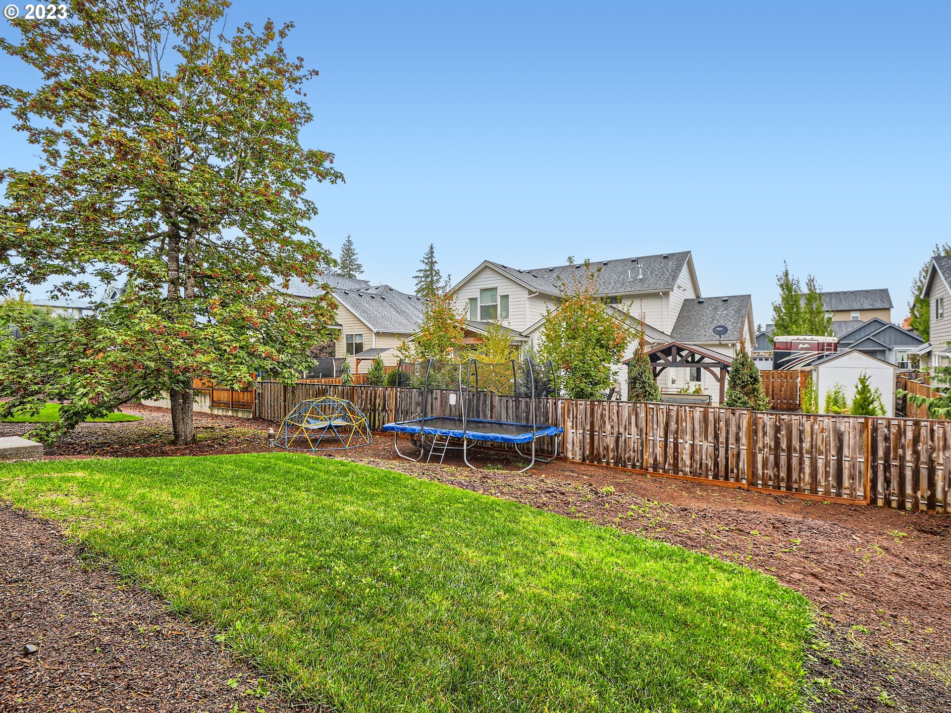 38439 Maple Street Sandy, OR 97055 - Photo 32 of 34 a view of a house with a big yard and large trees