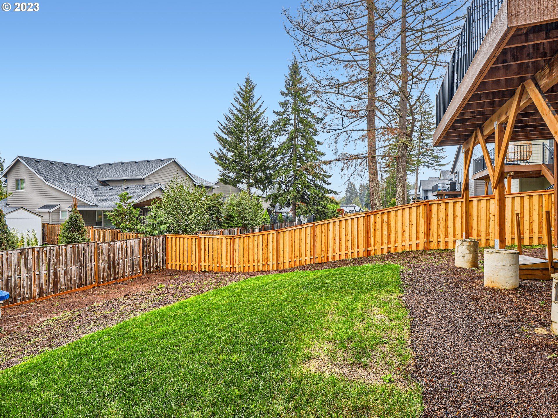 38439 Maple Street Sandy, OR 97055 - Photo 33 of 34 a view of a house with backyard and porch