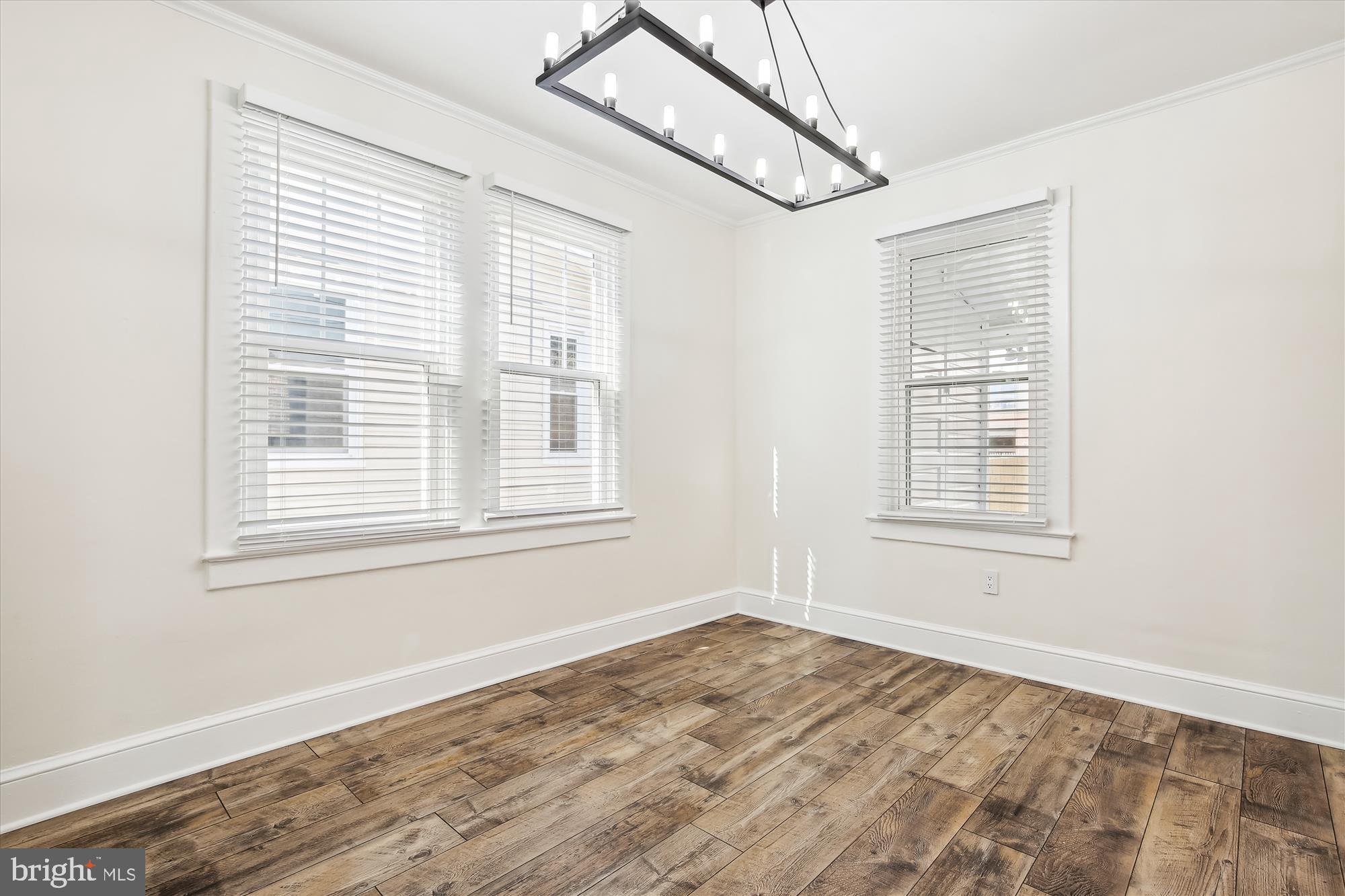 3107 9th Road North Arlington, VA 22201 - Photo 15 of 34 a view of an empty room with wooden floor and a window