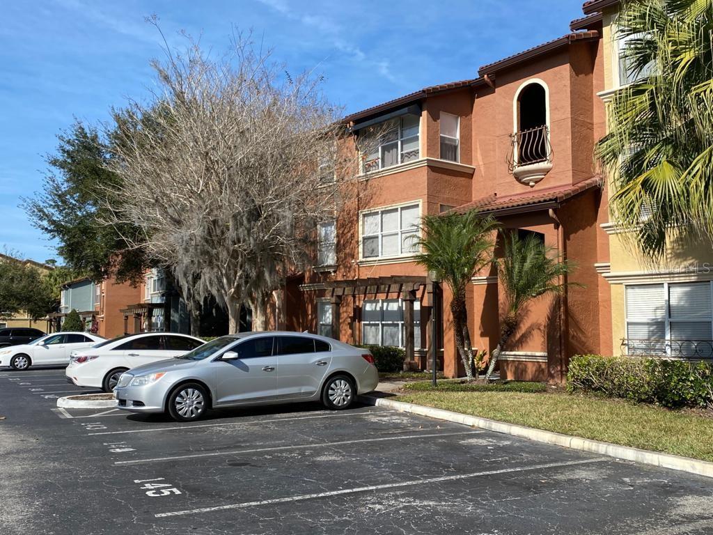 5140 Conroy Road, Unit 12 Orlando, FL 32811 - Photo 1 of 1 a view of a car parked in front of a building