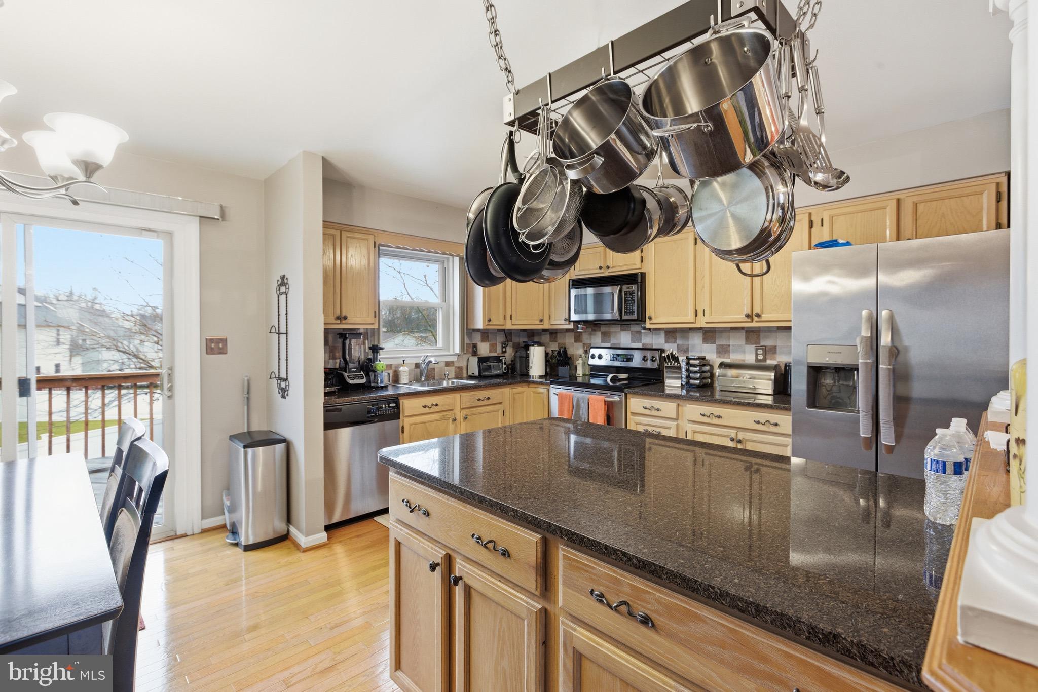 8913 Chad Way Clinton, MD 20735 - Photo 14 of 34 kitchen with exit to deck