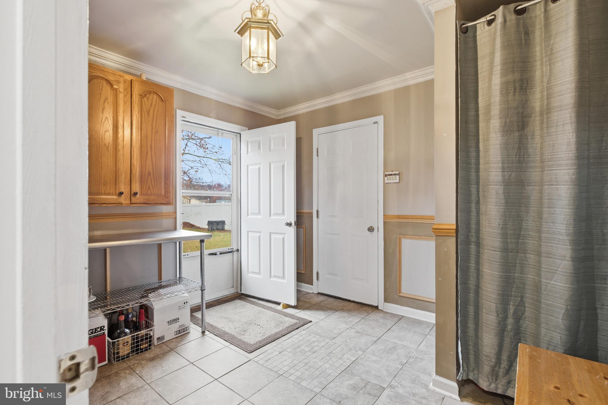 8913 Chad Way Clinton, MD 20735 - Photo 28 of 34 utility/laundry room with exit