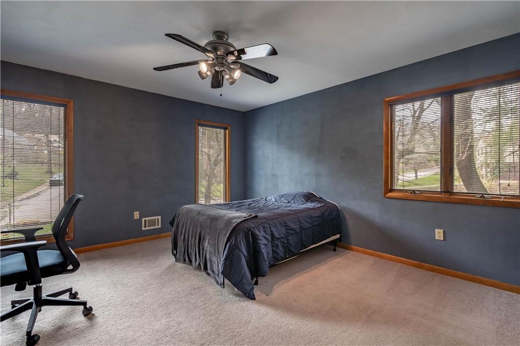 970 Braddock Road Pittsburgh, PA 15221 - Photo 18 of 25 a living room with a bed furniture and a window