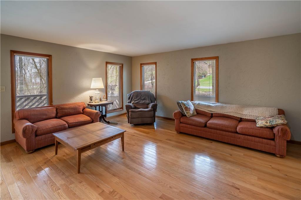 970 Braddock Road Pittsburgh, PA 15221 - Photo 4 of 25 a living room with furniture and a window