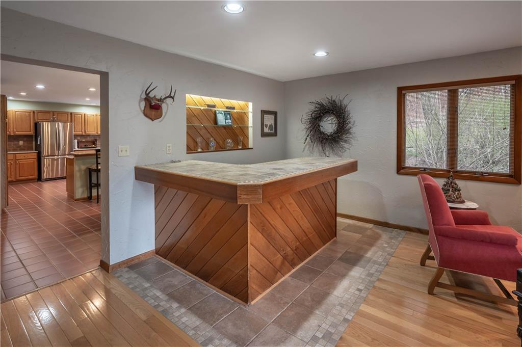 970 Braddock Road Pittsburgh, PA 15221 - Photo 6 of 25 a kitchen with stainless steel appliances granite countertop a sink and a large window