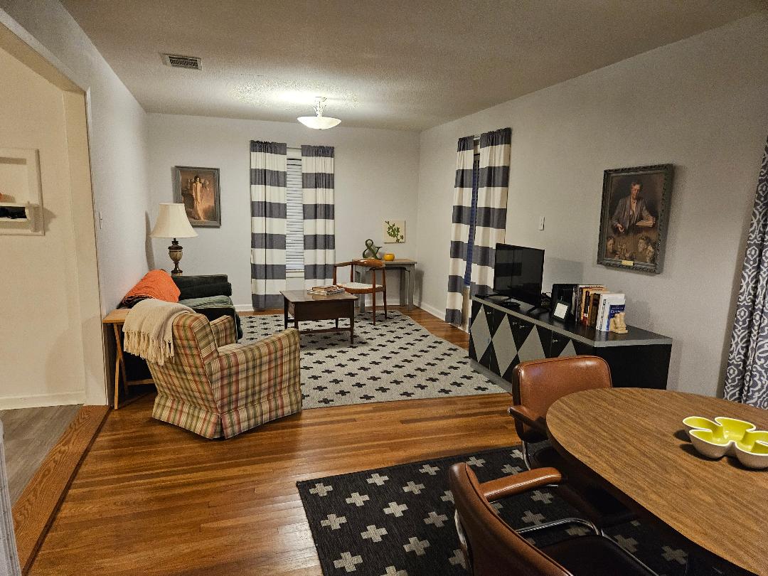 1130 North Main Street Elgin, TX 78621 - Photo 1 of 1 Living room with wood floors. All the furnishing can stay.