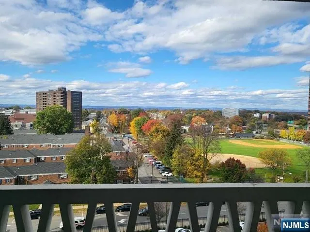 a view of city with ocean