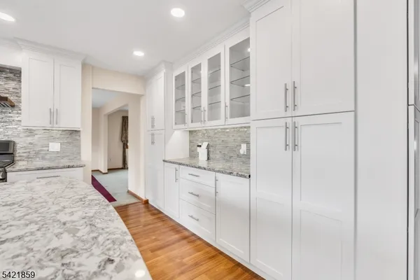 a bathroom with a shower and a sink