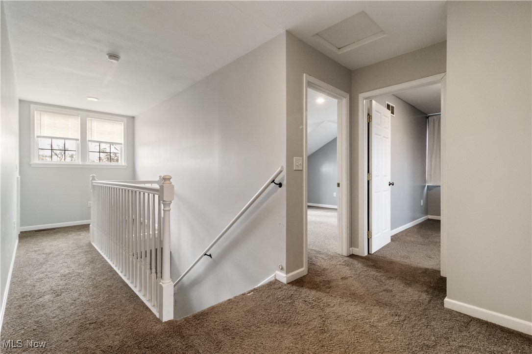 57459 Shry Road Barnesville, OH 43713 - Photo 10 of 44 Corridor with an upstairs landing, carpet flooring, and attic access