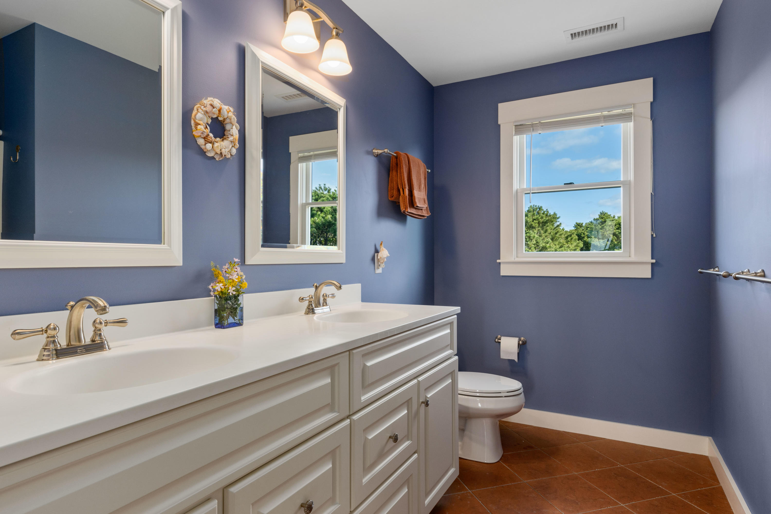 41 Twine Field Road Truro, MA 02666 - Photo 26 of 54 a bathroom with a granite countertop toilet sink and mirror
