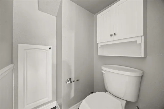 a kitchen with stainless steel appliances granite countertop a sink a stove and cabinets