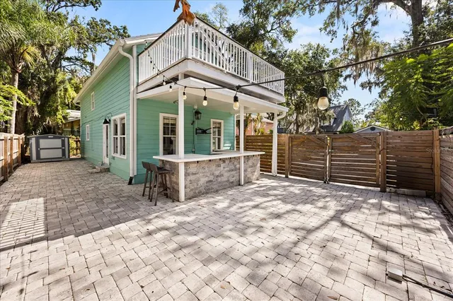 a view of a porch with a tree