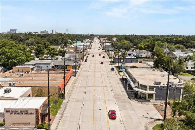 a view of a house with wooden deck