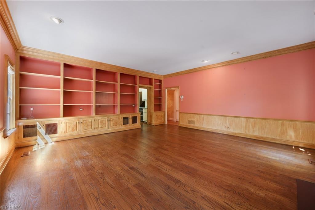 2020 Virginia Road Winston-Salem, NC 27104 - Photo 26 of 40 Den/library leads back to kitchen and living room providing a nice flow