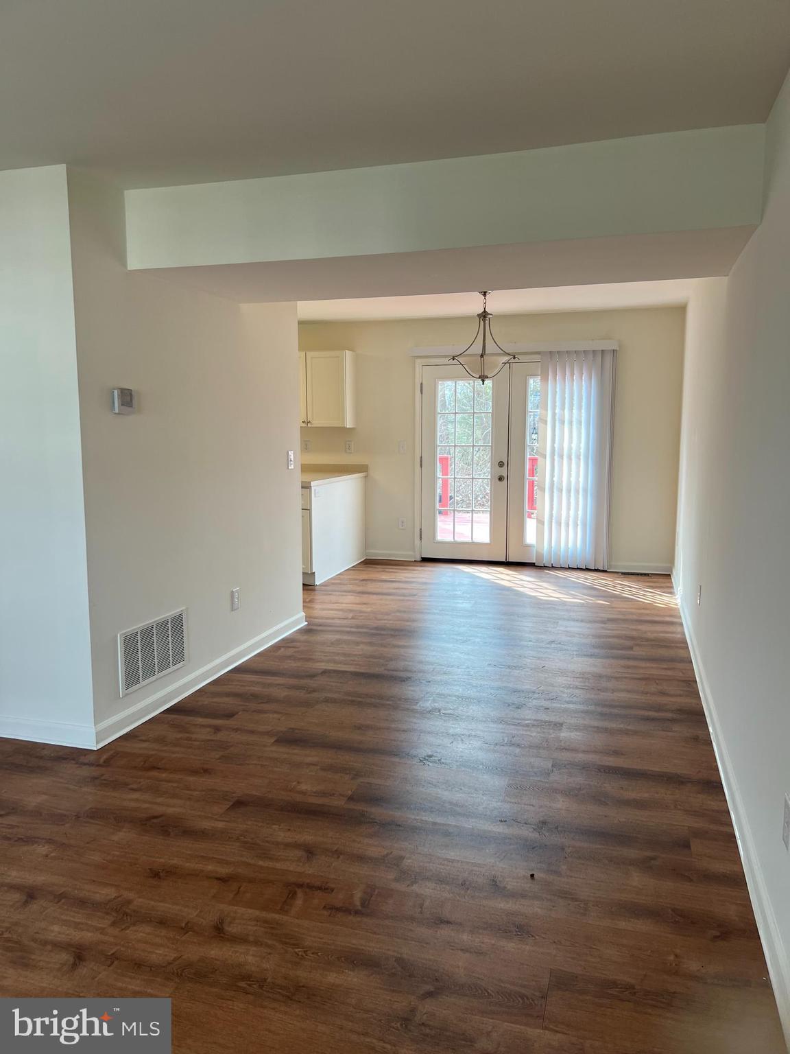 7772 Old House Road Pasadena, MD 21122 - Photo 6 of 23 dining area with entrance to deck