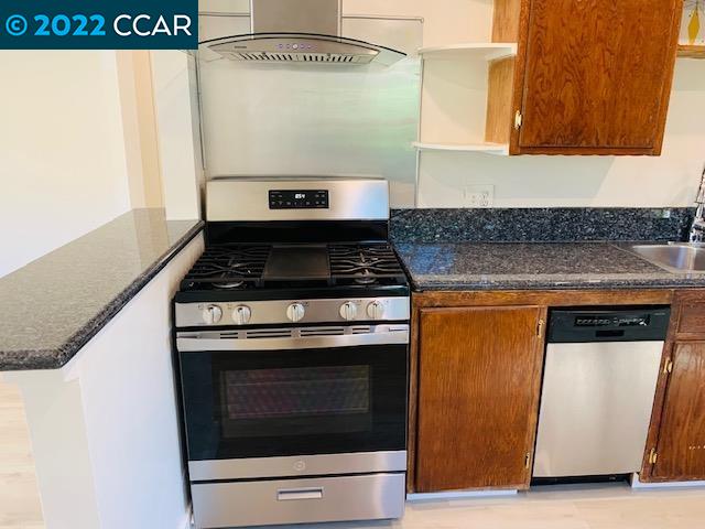 3263 Hillview Lane Lafayette, CA 94549 - Photo 14 of 24 a kitchen with a stove and a microwave