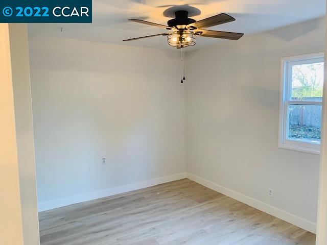 3263 Hillview Lane Lafayette, CA 94549 - Photo 16 of 24 a view of room with hardwood floor and ceiling fan
