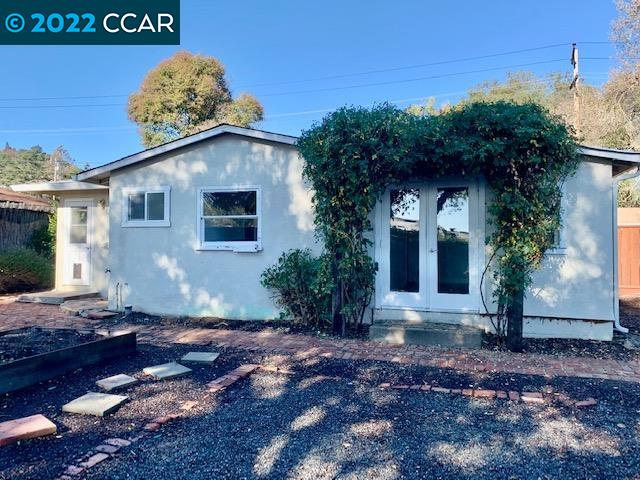 3263 Hillview Lane Lafayette, CA 94549 - Photo 10 of 24 a front view of a house with a yard