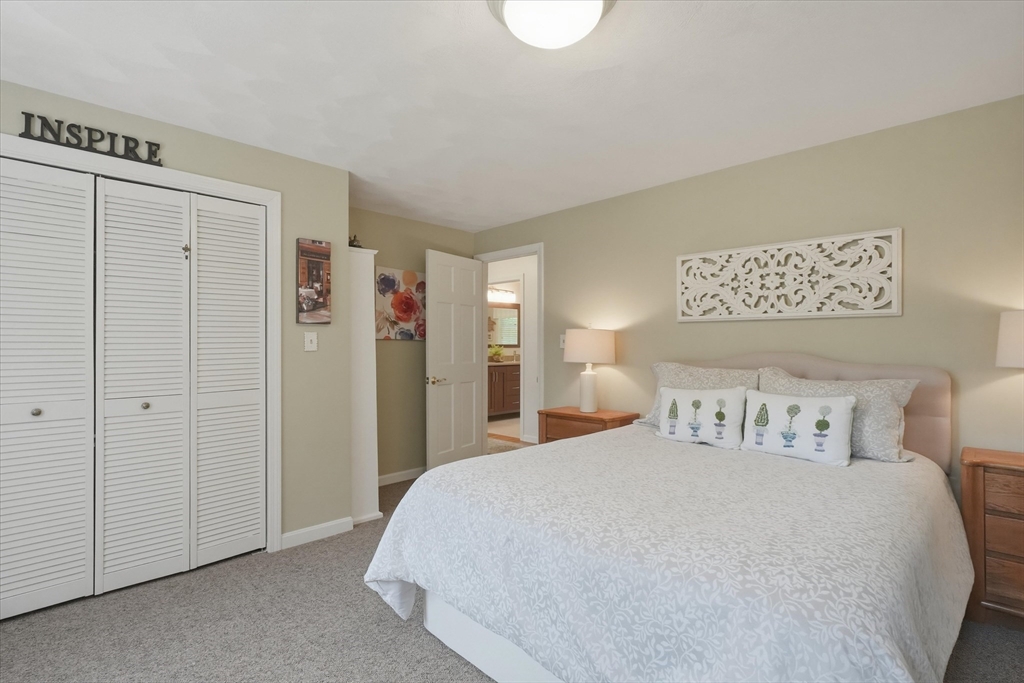 9 Fazio Farm Road Georgetown, MA 01833 - Photo 27 of 42 a bedroom with a bed and a night stand