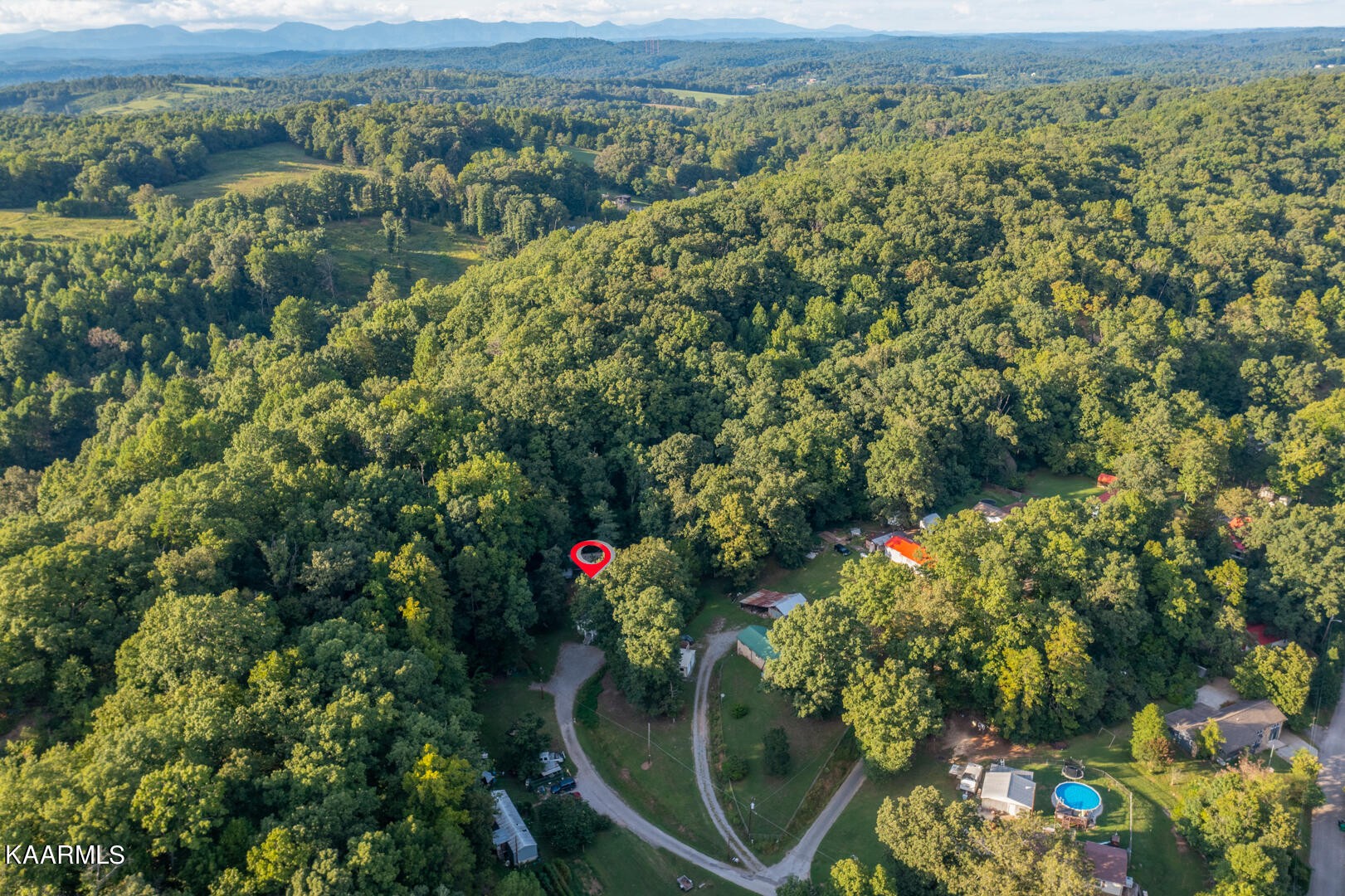 203 Duggan Road Lenoir City, TN 37771 - Photo 15 of 16 an aerial view of residential houses with outdoor space and covered view