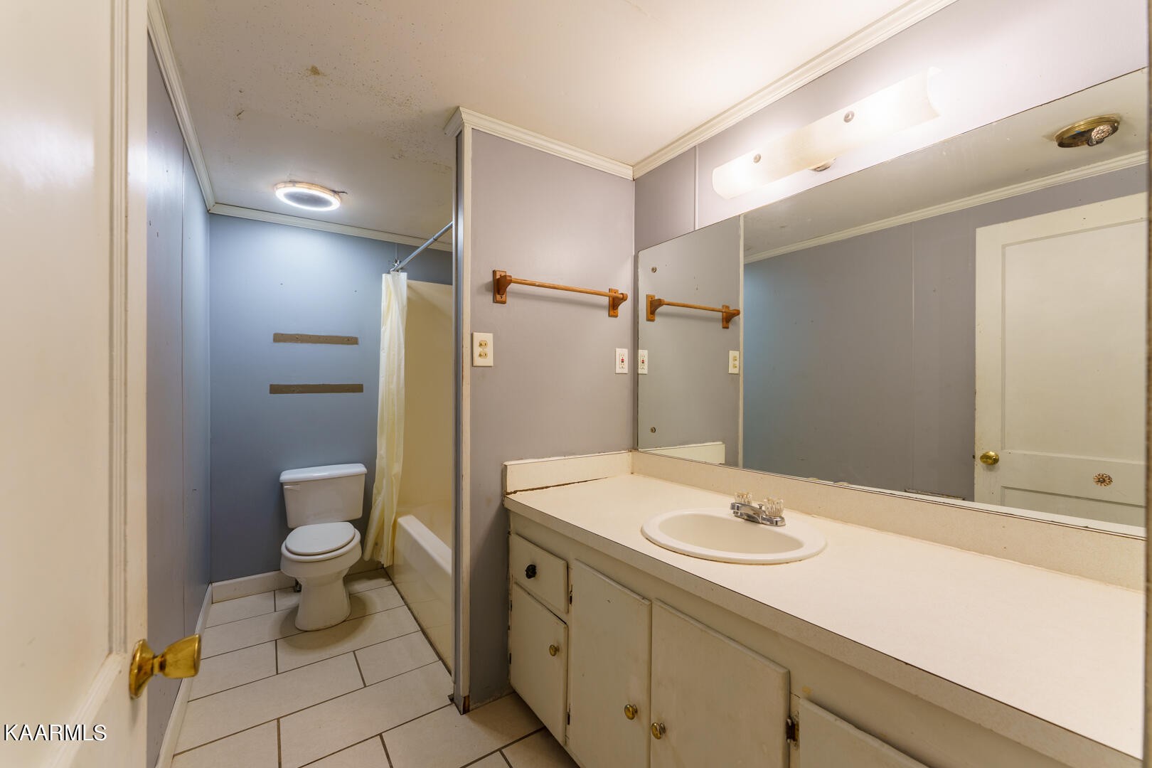 203 Duggan Road Lenoir City, TN 37771 - Photo 6 of 16 a bathroom with a sink a toilet and shower