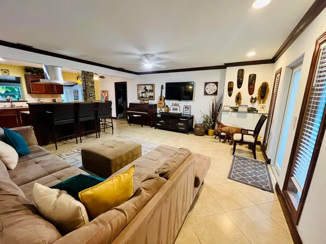a view of a living room and dining room