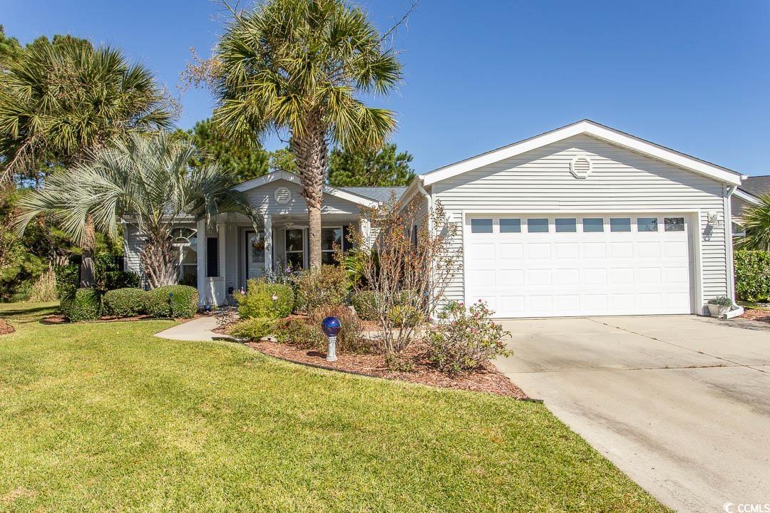 177 Wellspring Drive Conway, SC 29526 - Photo 1 of 40 Single story home featuring a front yard and a gar