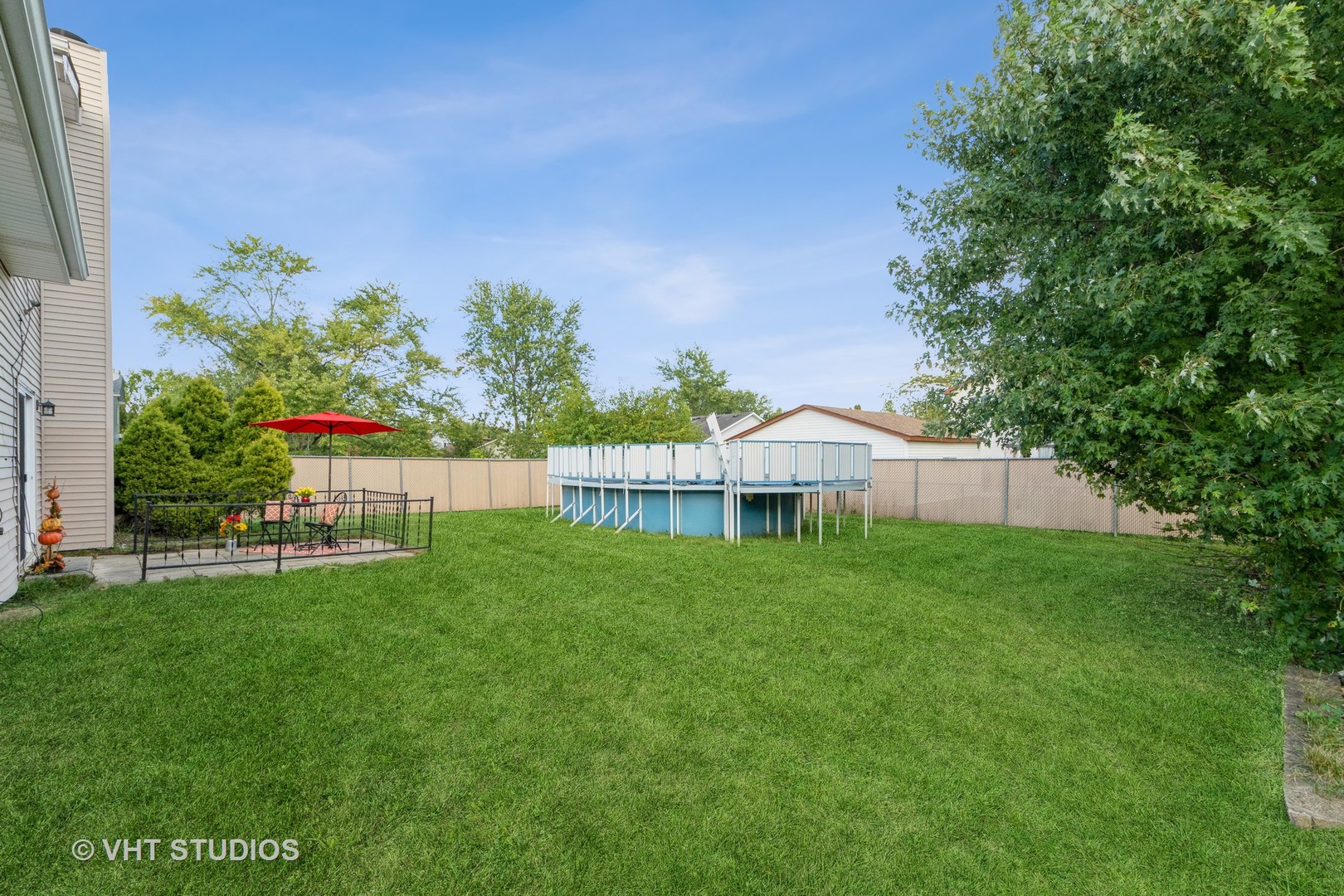 57 Timberlane Road Matteson, IL 60443 - Photo 19 of 25 a view of a house with a yard and sitting area