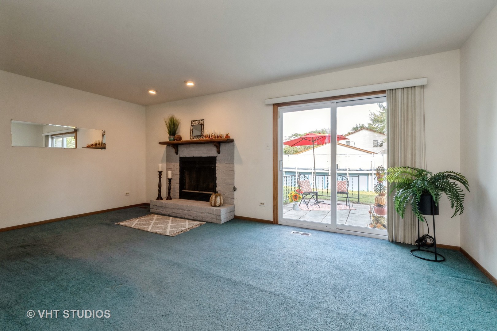 57 Timberlane Road Matteson, IL 60443 - Photo 24 of 25 a view of an empty room with a window and a fireplace