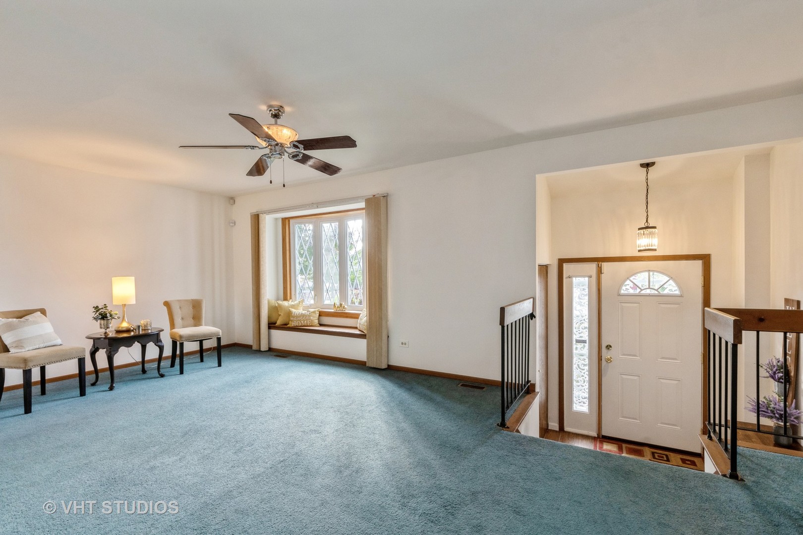 57 Timberlane Road Matteson, IL 60443 - Photo 4 of 25 a view of a livingroom with furniture and a ceiling fan