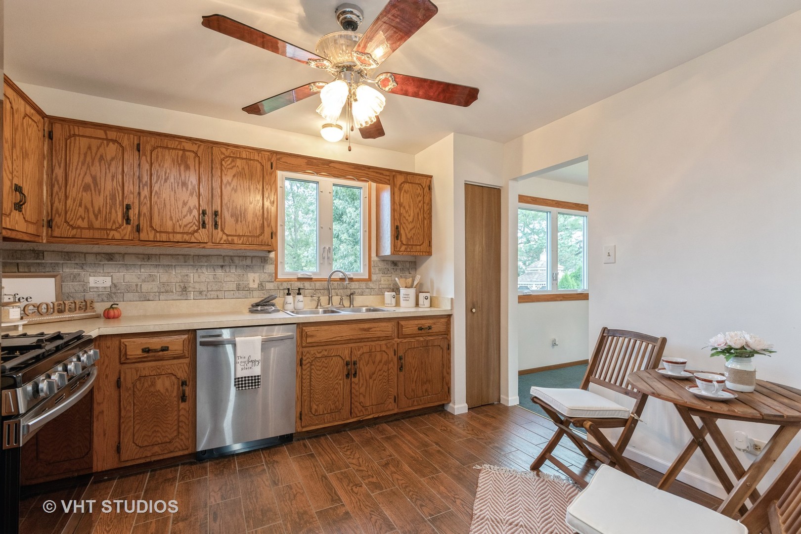 57 Timberlane Road Matteson, IL 60443 - Photo 6 of 25 a kitchen with a sink cabinets and window
