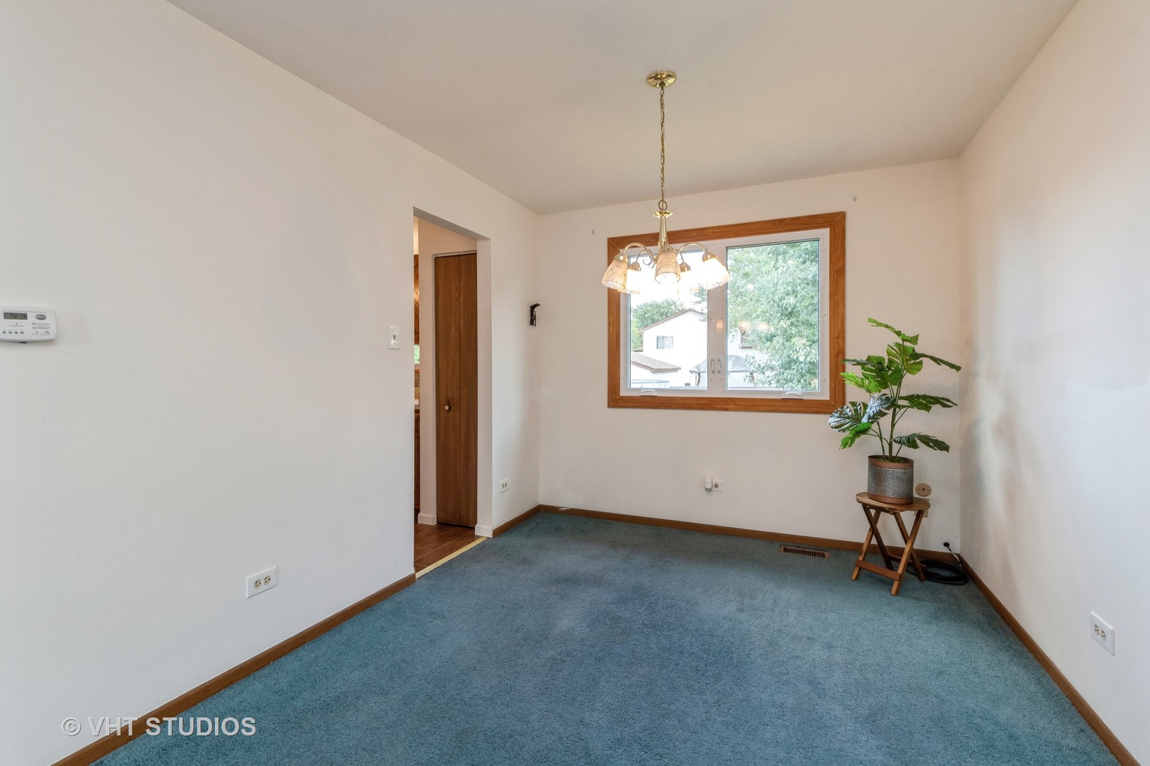 57 Timberlane Road Matteson, IL 60443 - Photo 8 of 25 a view of an empty room with a window