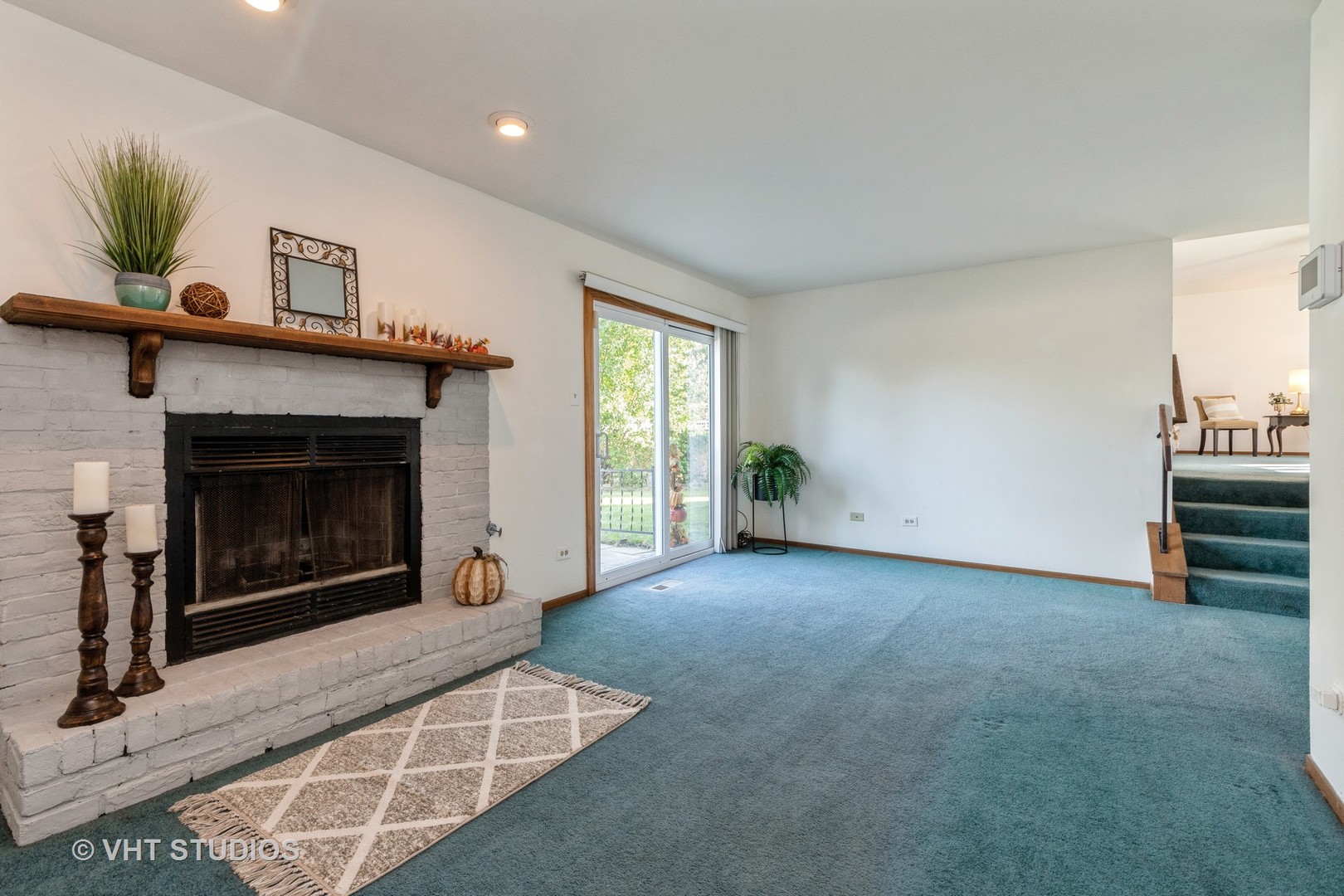 57 Timberlane Road Matteson, IL 60443 - Photo 9 of 25 a living room with furniture and a fireplace