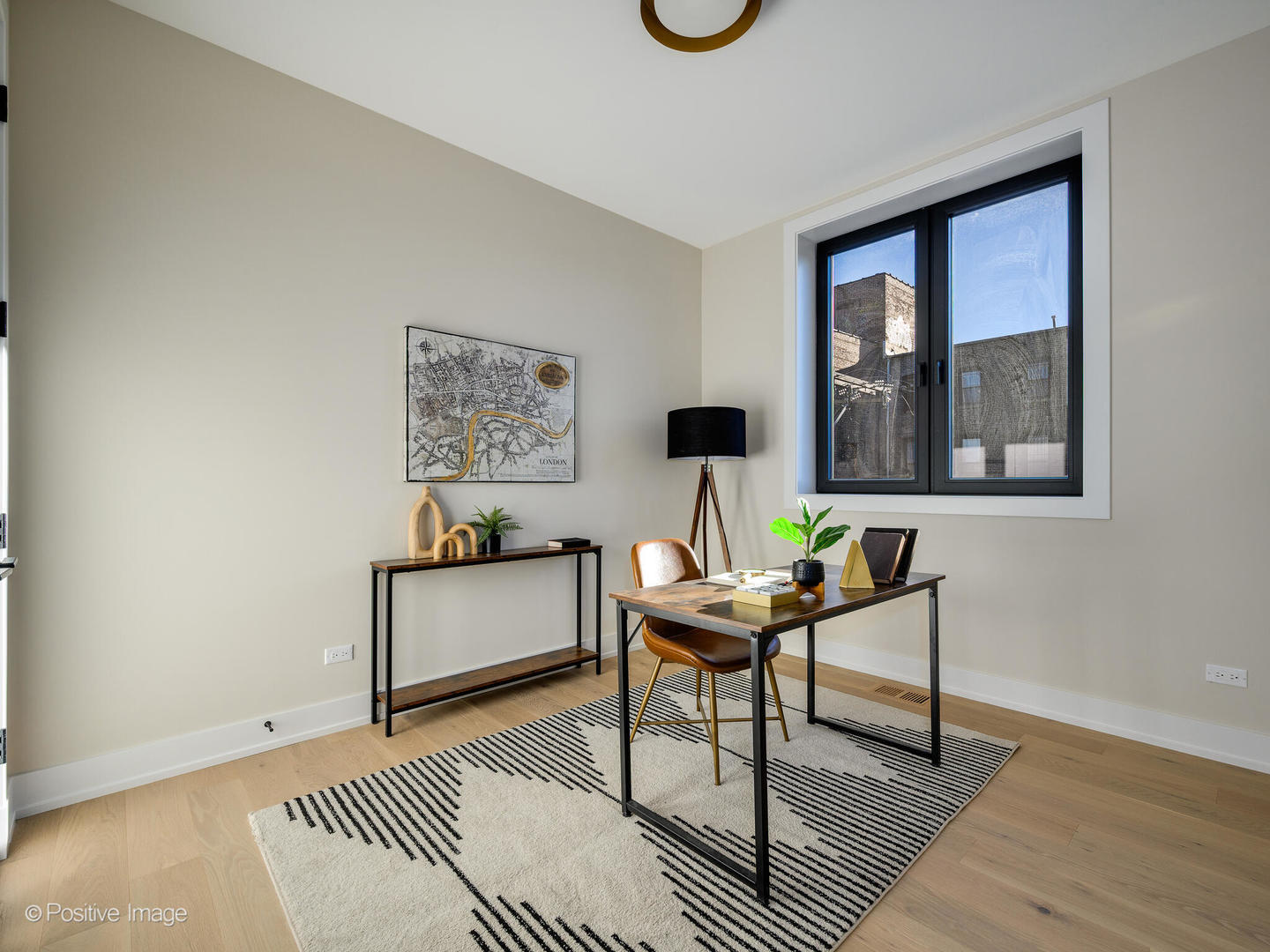 1412 North Elk Grove Avenue, Unit E Chicago, IL 60622 - Photo 14 of 24 a living room with furniture and a window