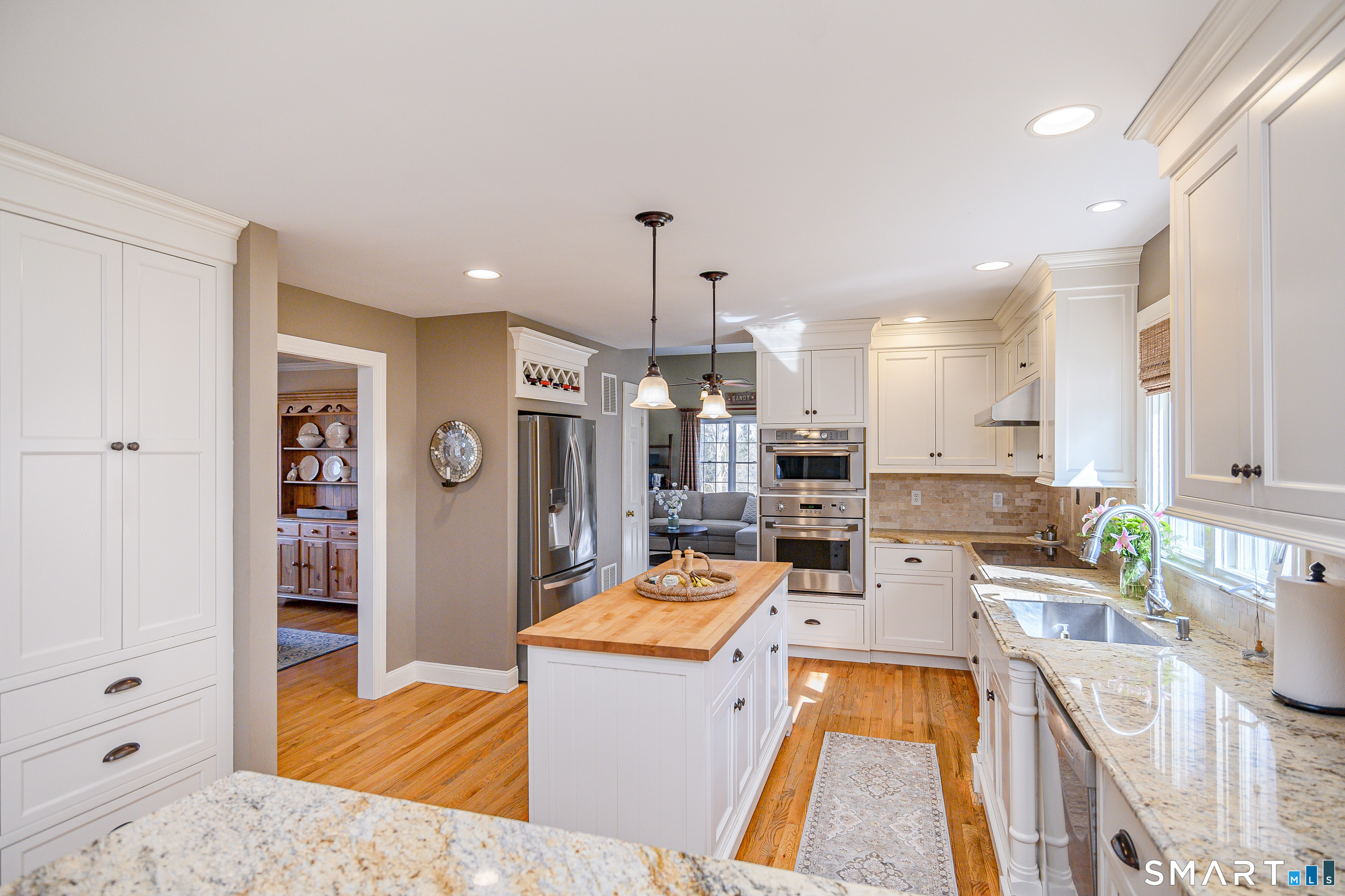 20 Charter Ridge Drive Newtown, CT 06482 - Photo 11 of 40 Beautiful updated kitchen with cream colored cabinets and granite counter tops.