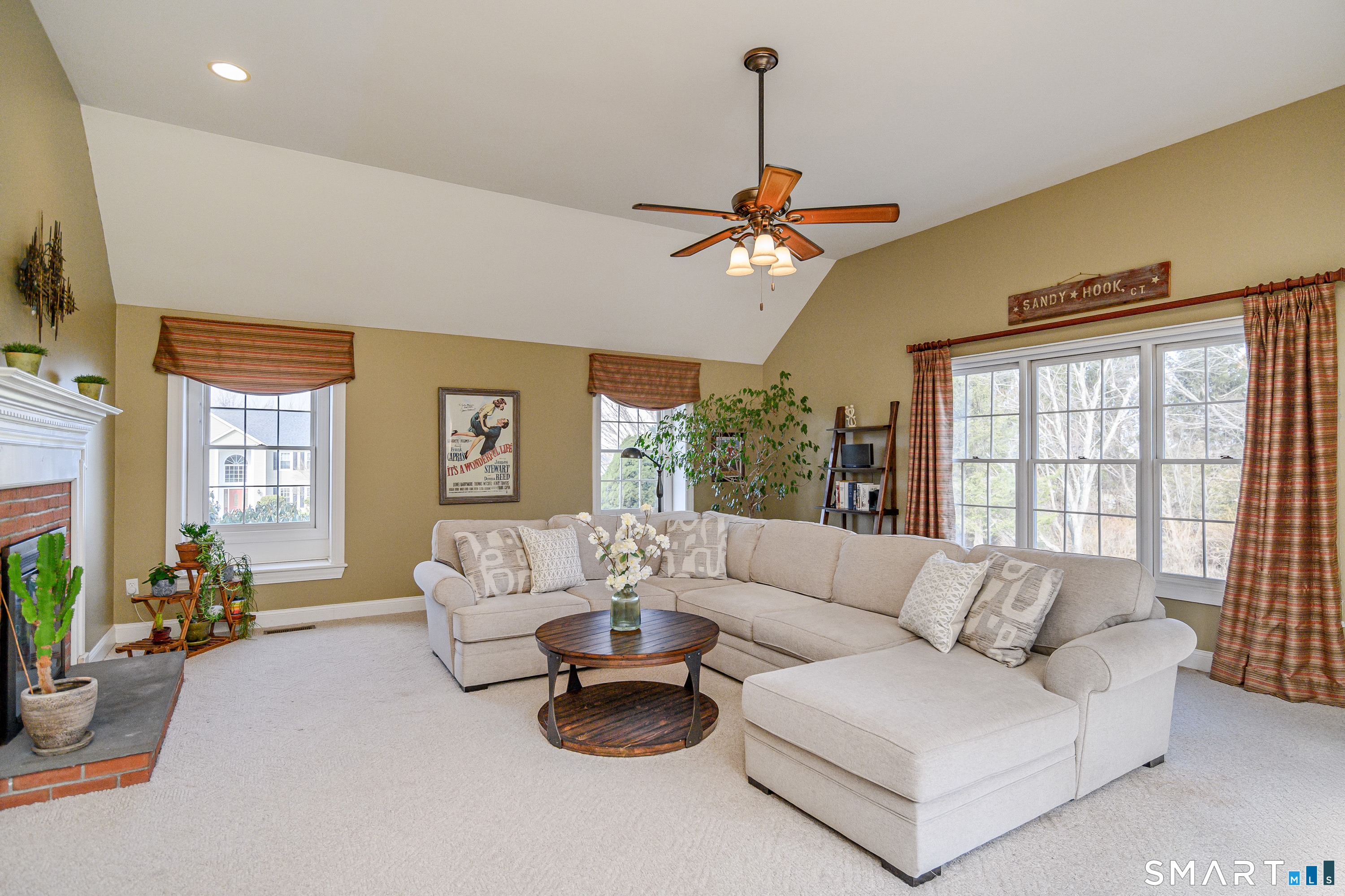 20 Charter Ridge Drive Newtown, CT 06482 - Photo 15 of 40 The great room with vaulted ceiling and natural light.