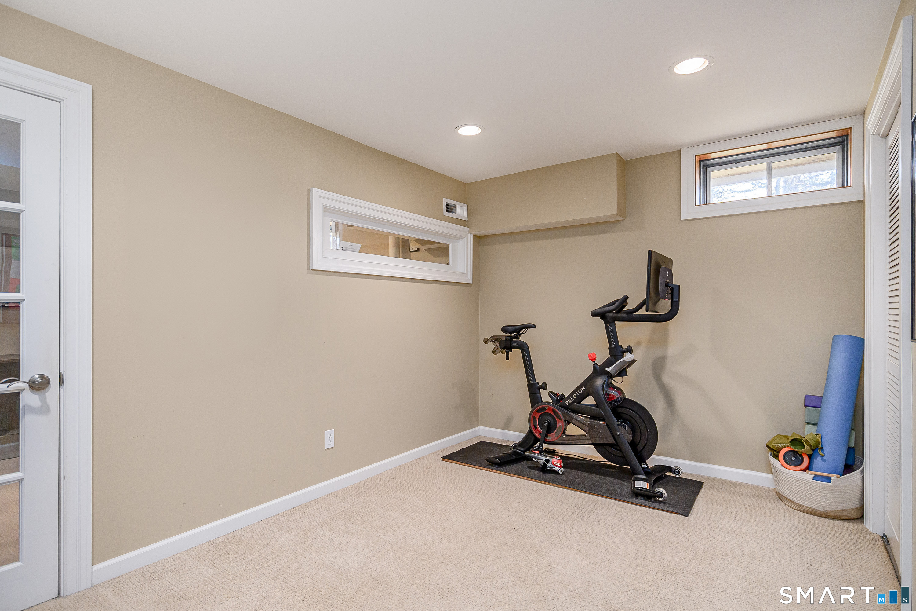 20 Charter Ridge Drive Newtown, CT 06482 - Photo 27 of 40 Home gym or playroom in the finished portion of the basement.