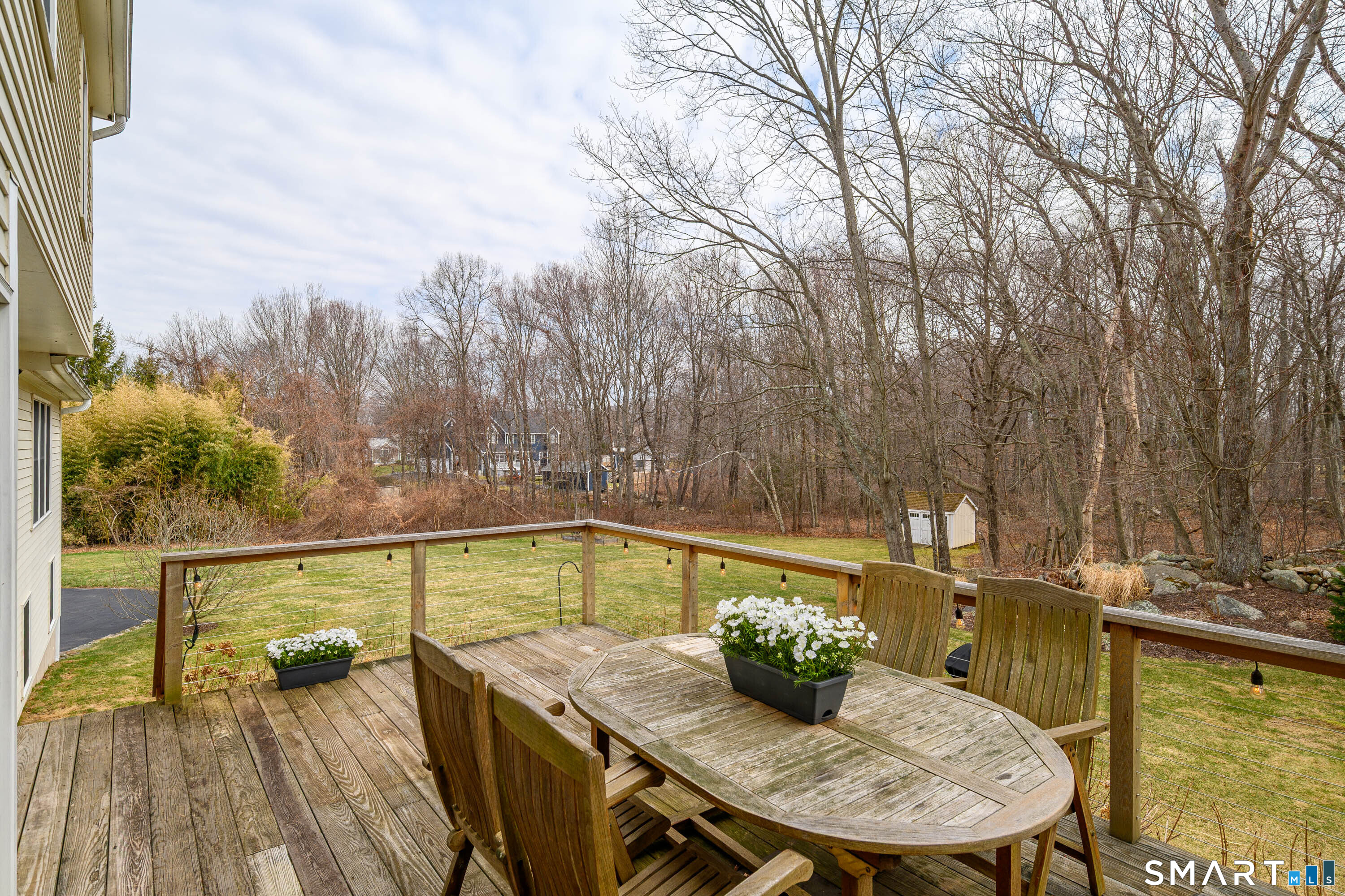 20 Charter Ridge Drive Newtown, CT 06482 - Photo 30 of 40 A view of the back deck overlooking the private backyard.