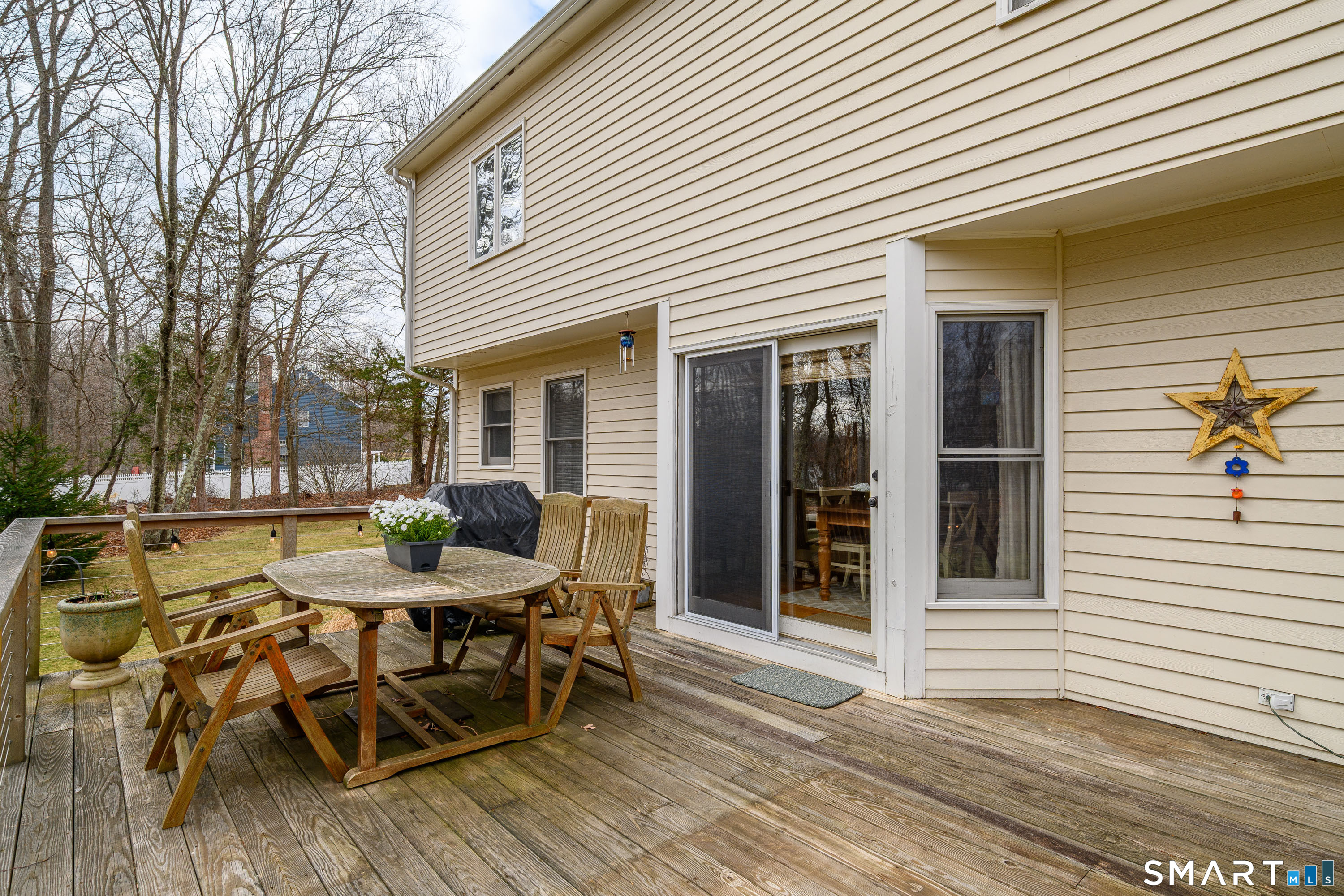20 Charter Ridge Drive Newtown, CT 06482 - Photo 31 of 40 Step through the french door onto the large deck with cable railing for unobstructed views of the yard.