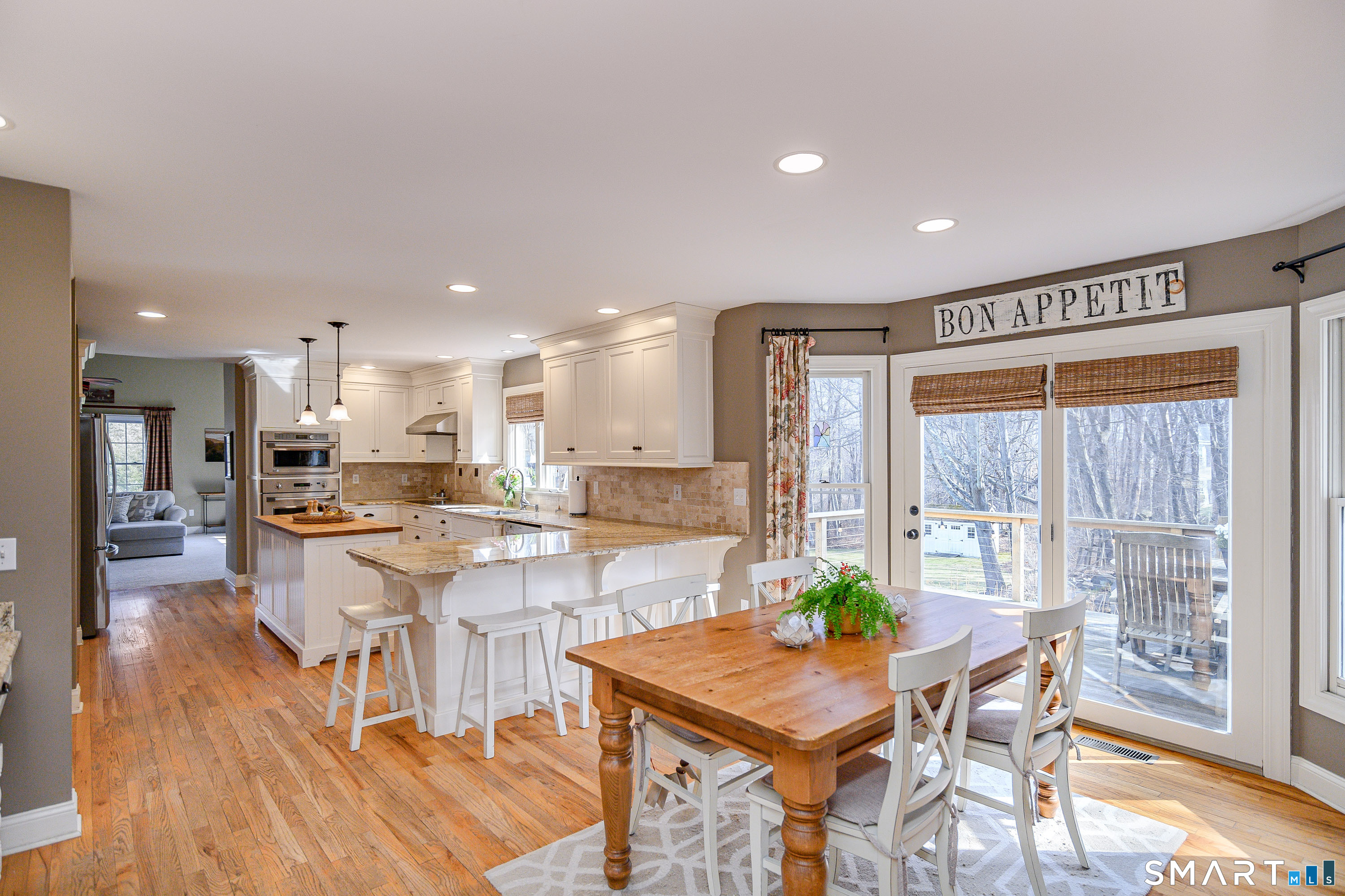 20 Charter Ridge Drive Newtown, CT 06482 - Photo 10 of 40 A large eat-in kitchen with french door leading to the back deck.