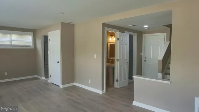 a view of entryway with wooden floor