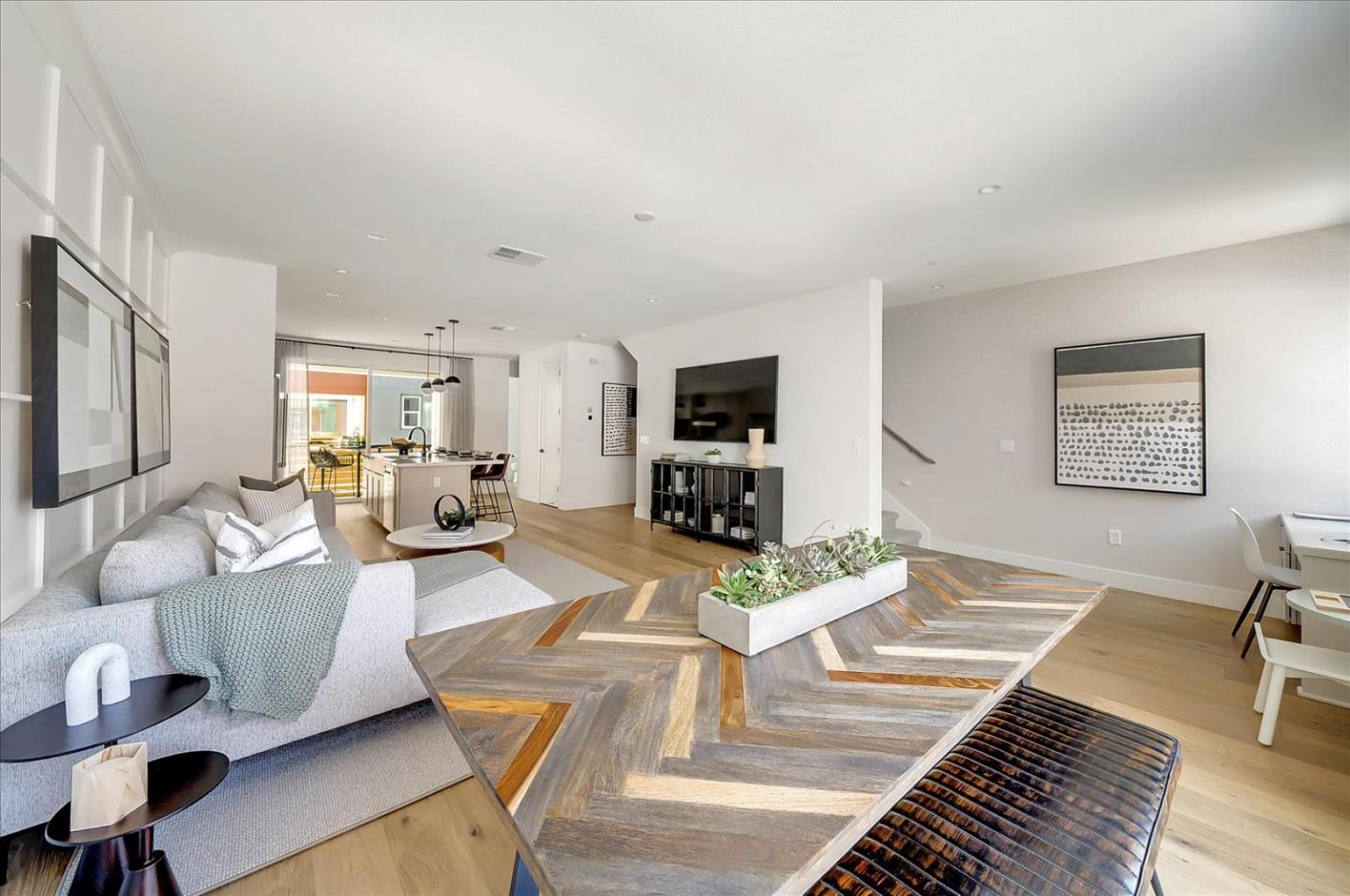 567 Pilgrim Drive Foster City, CA 94404 - Photo 3 of 14 a living room with fireplace furniture and a flat screen tv